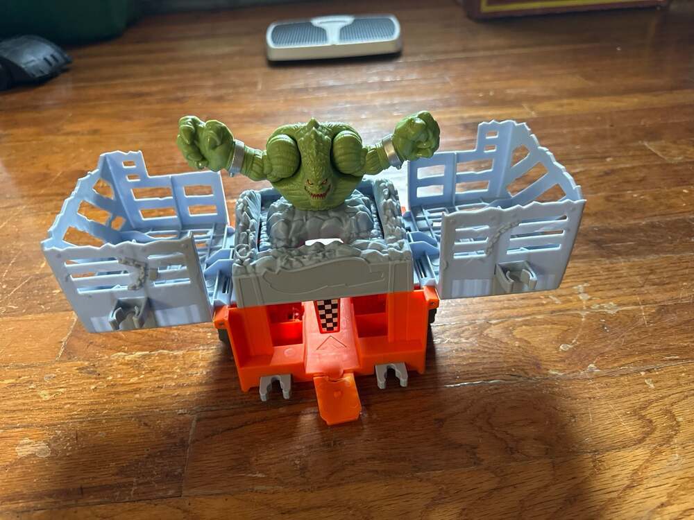 Green Monster Playset Figure with Orange and Gray Play Base